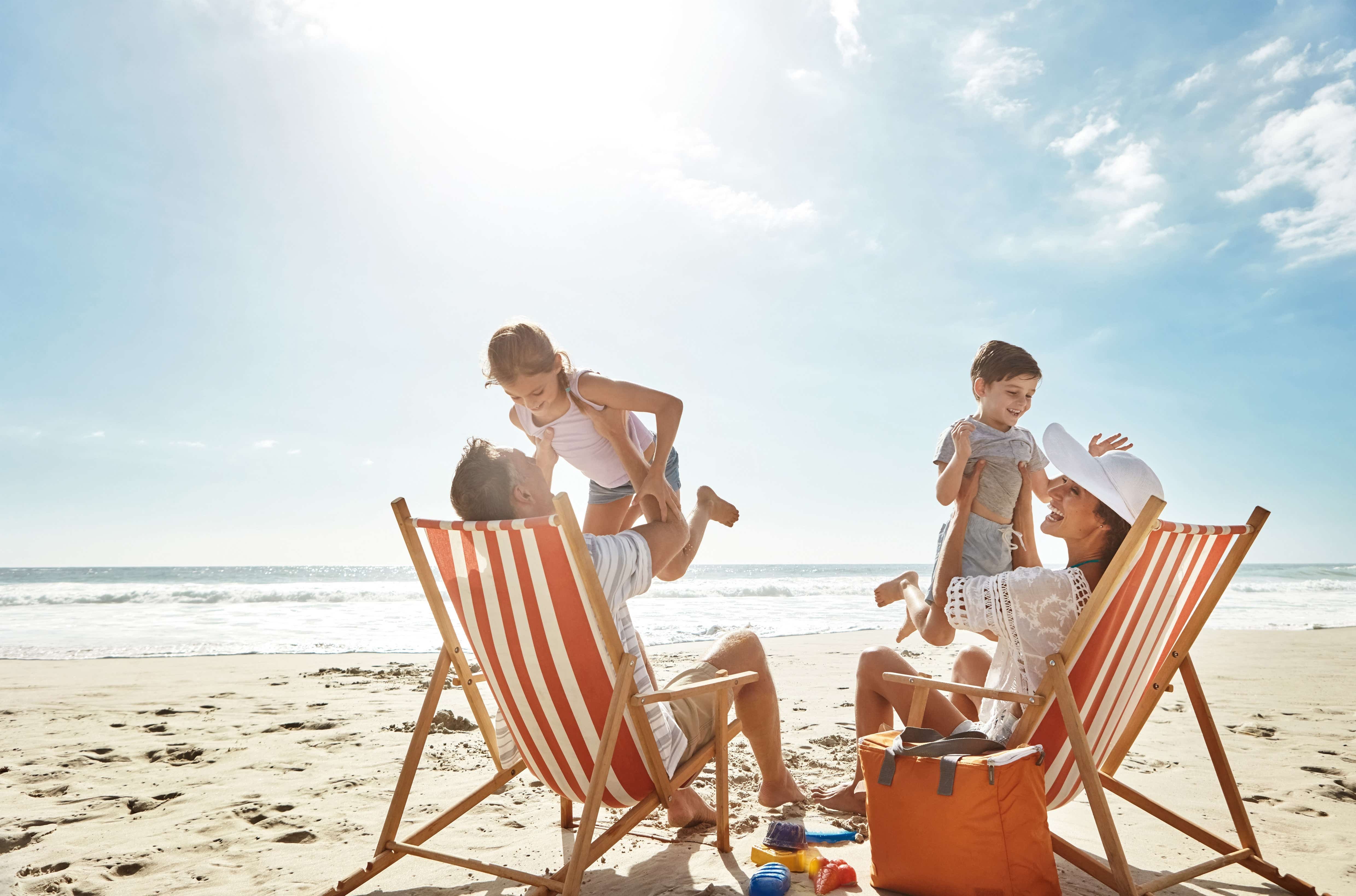Family on a beach having fun